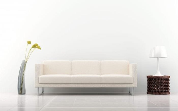 светлый диван в дизайне спальни