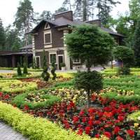 шикарный ландшафтный дизайн сада в английском стиле с цветами фото