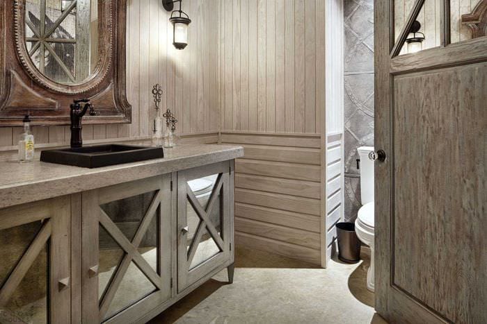 вариант современного интерьера ванной комнаты в деревянном доме