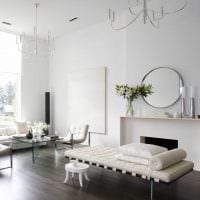 пример красивого интерьера гостиной комнаты в стиле минимализм картинка