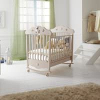 детская комната для новорожденного бежевая кроватка