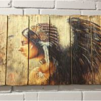 Деревянное панно с изображением индейца