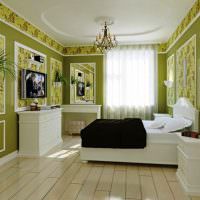 Белая мебель в комнате с зелеными стенами